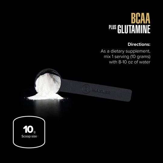 Spoon with powder and supplement container on a black background