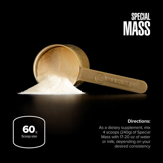 Gold scoop with Special Mass powder on a black background